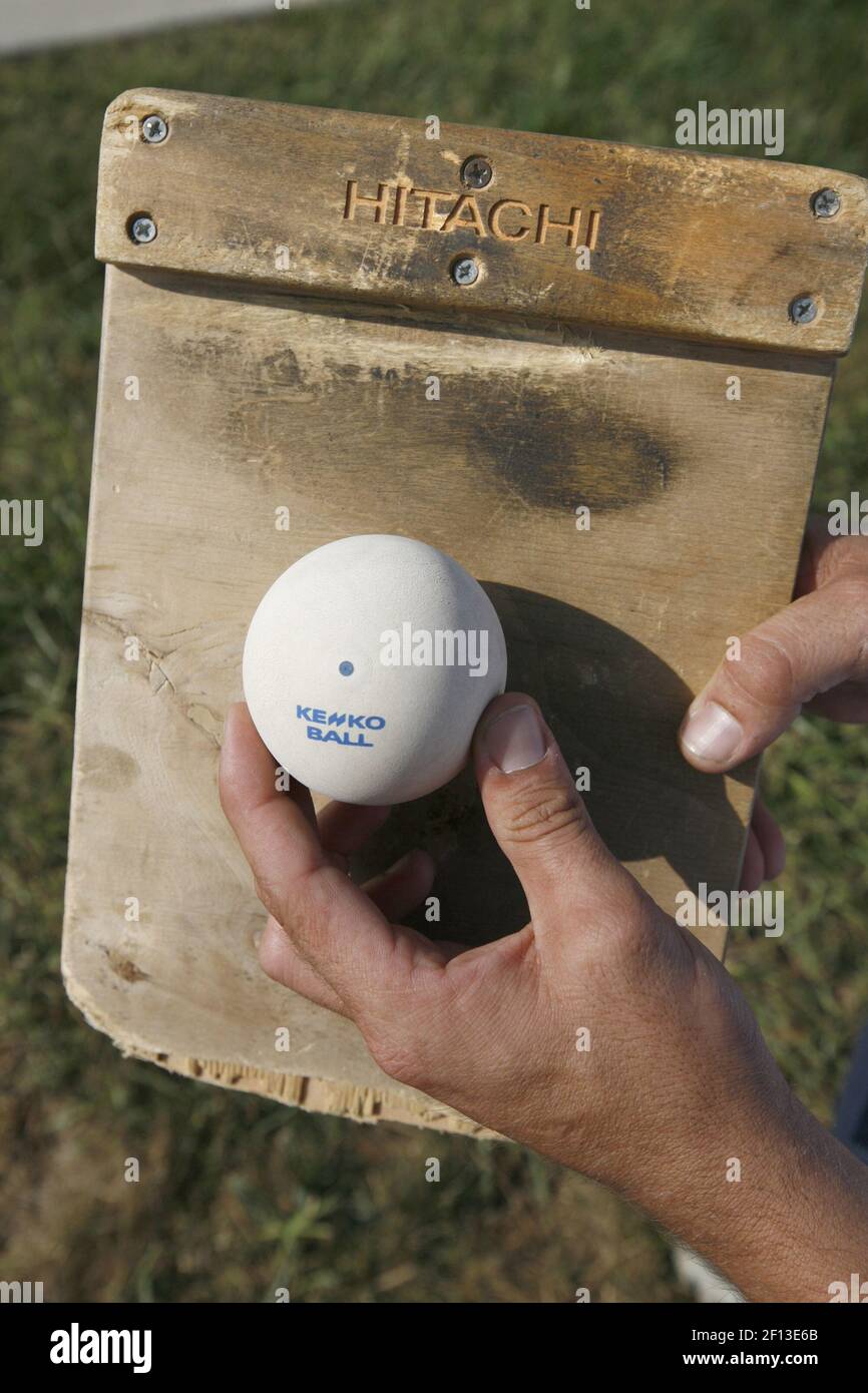 Pang pong, a hybrid of tennis and pingpong, is played with wooden