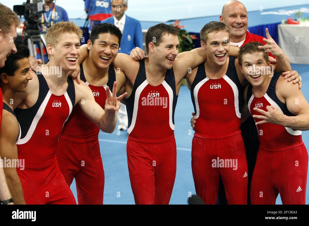 The United States' men's gymnastics team celebrates a bronze medal ...