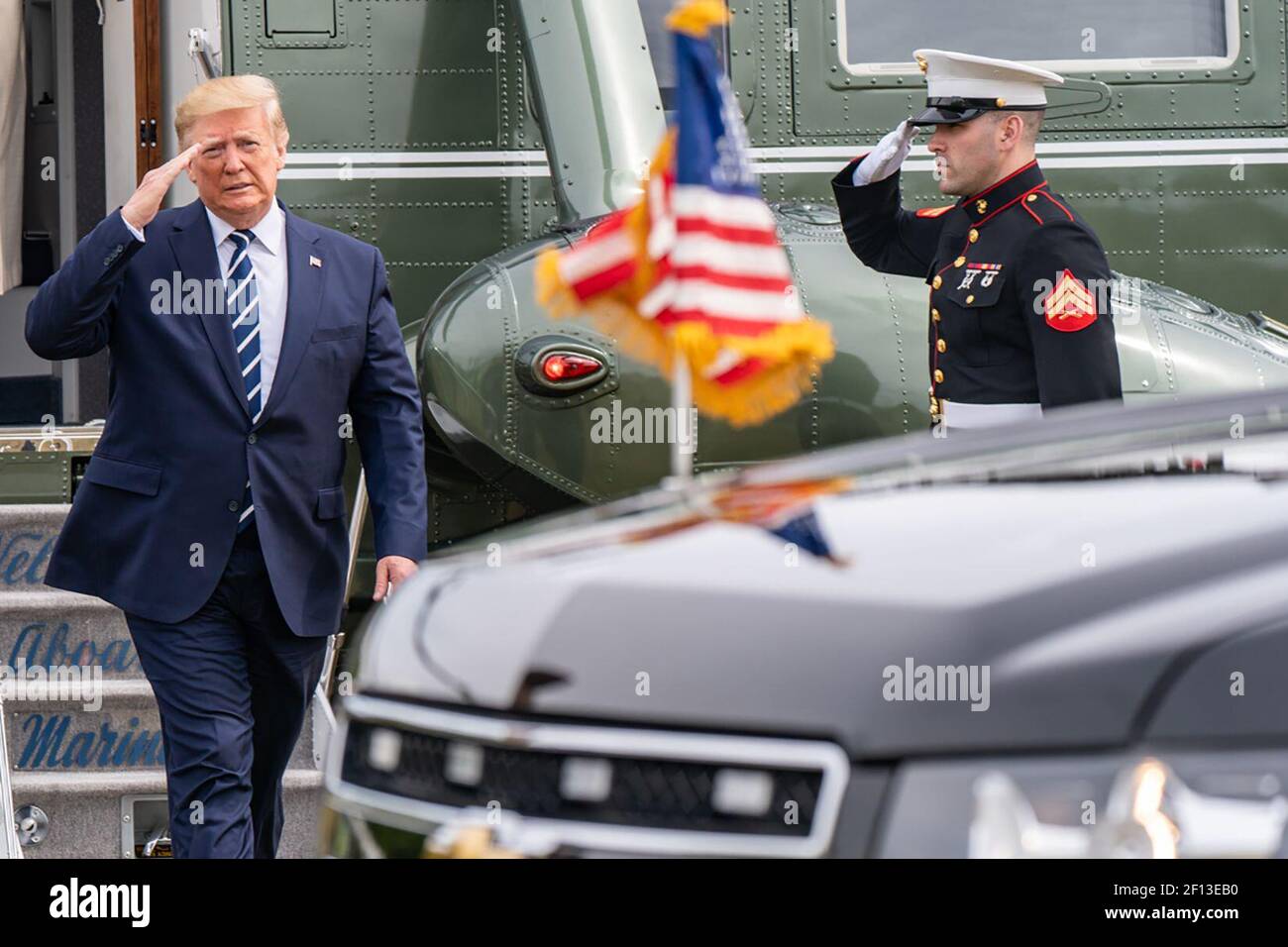 President Donald Trump salutes as he arrives Portsmouth Tuesday June 4 2019 for the Commemoration Ceremony honoring the 75th anniversary of D-Day. Stock Photo