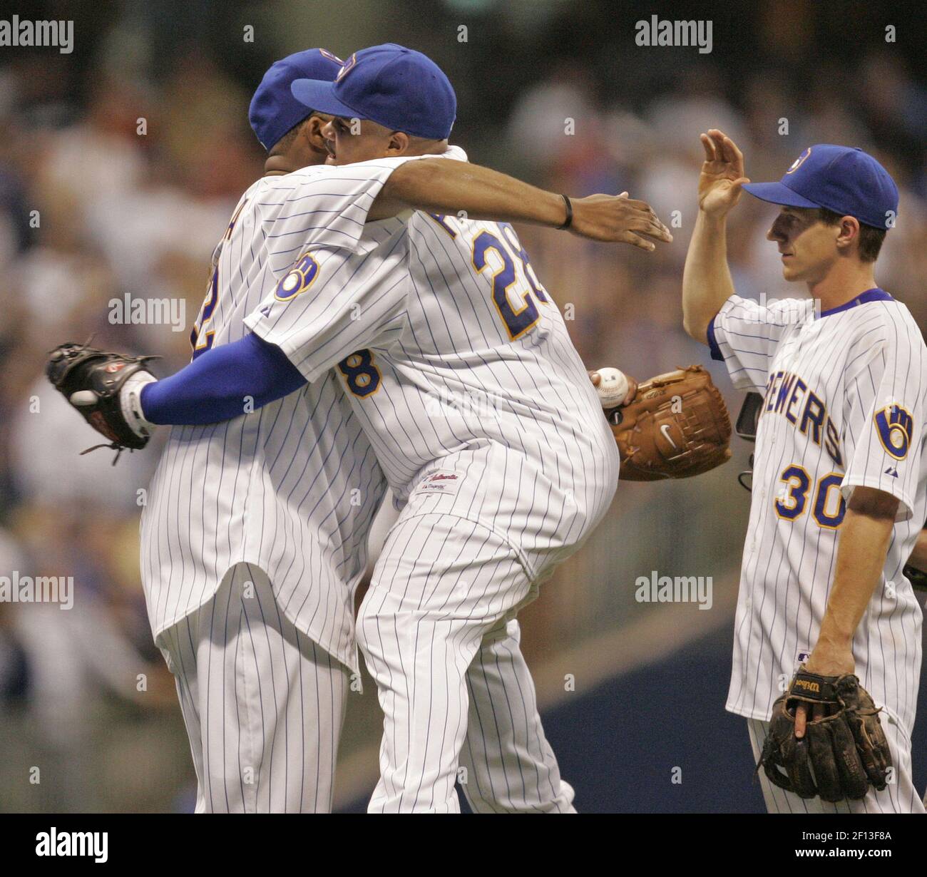 Milwaukee Brewers pitcher CC Sabathia reacts after giving up a double to  the Philadelphia Phillies during second inning baseball action in Game 2 of  the National League division series, Thursday, Oct. 2