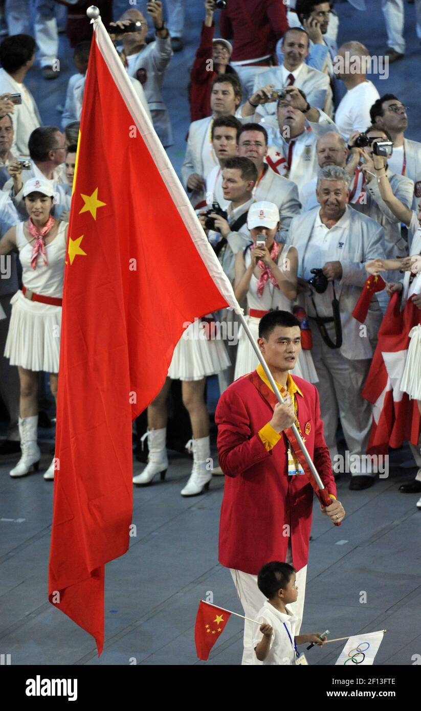 NBA star Yao Ming leads the Chinese team into the National Stadium ...