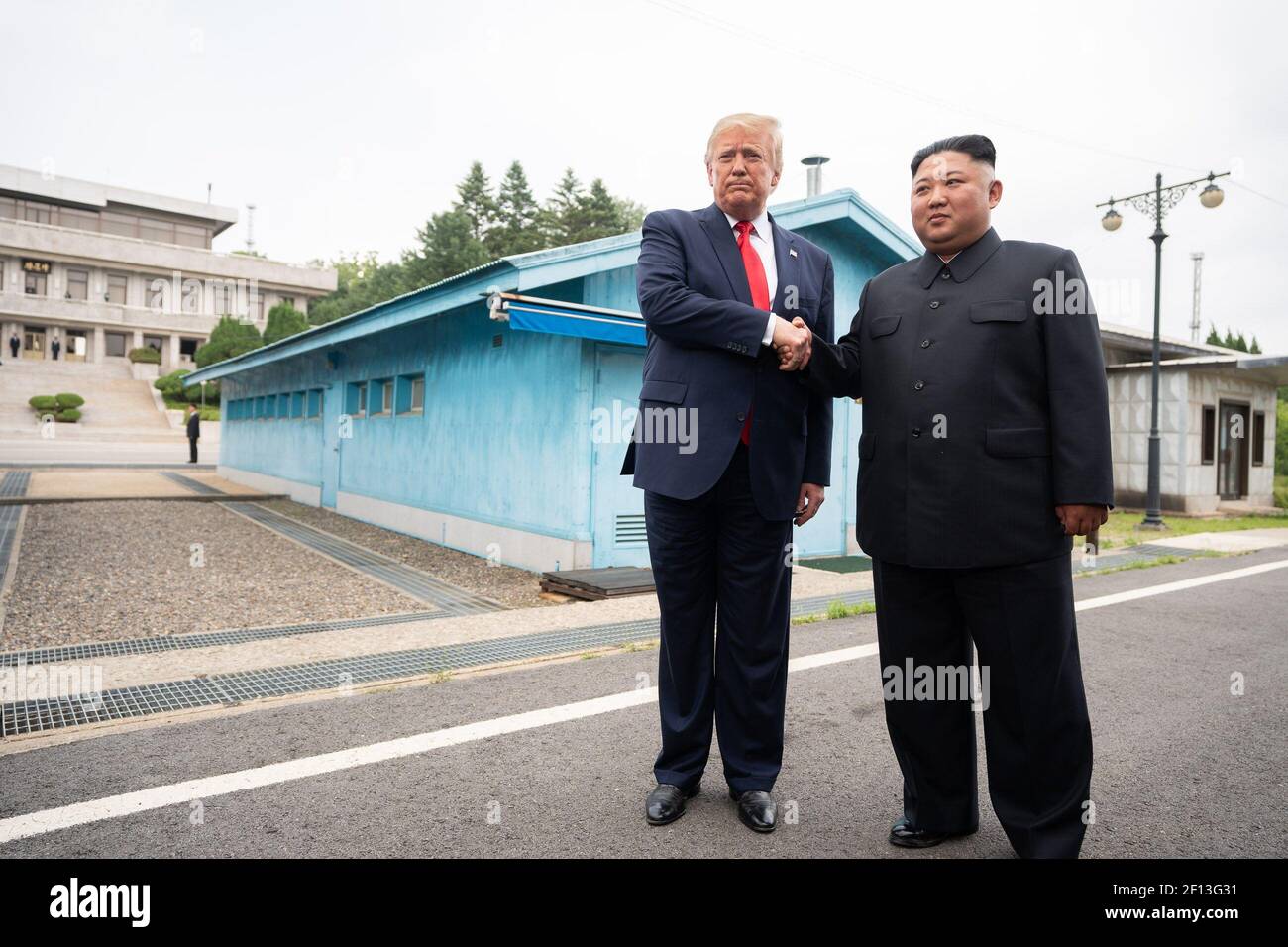 President Donald Trump and Chairman of the Workers' Party of Korea Kim Jong Un speak with reporters outside Freedom House Sunday June 30 2019 at the Korean Demilitarized Zone. Stock Photo