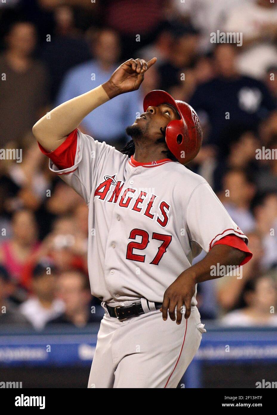 Los Angeles Angels Vladimir Guerrero points skyward as he crosses