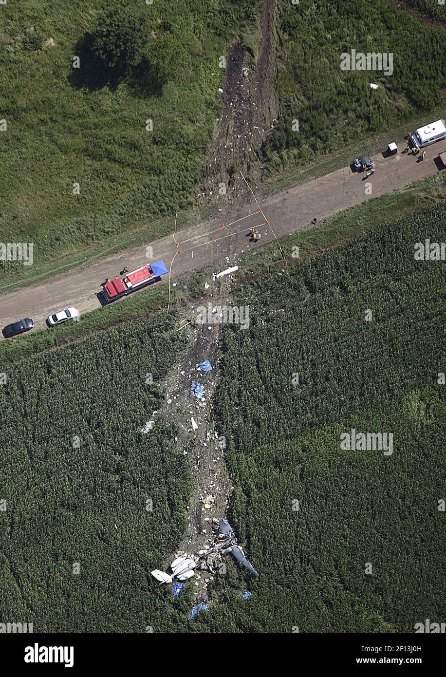 In this aerial view, investigators examine the scene of a fatal