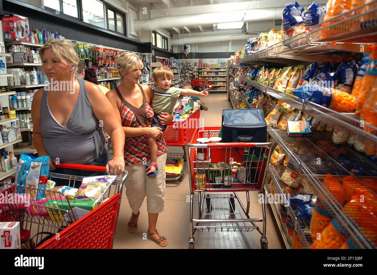 Abby of Fawn Grove, shops with her son, Hayden, 2, and mother
