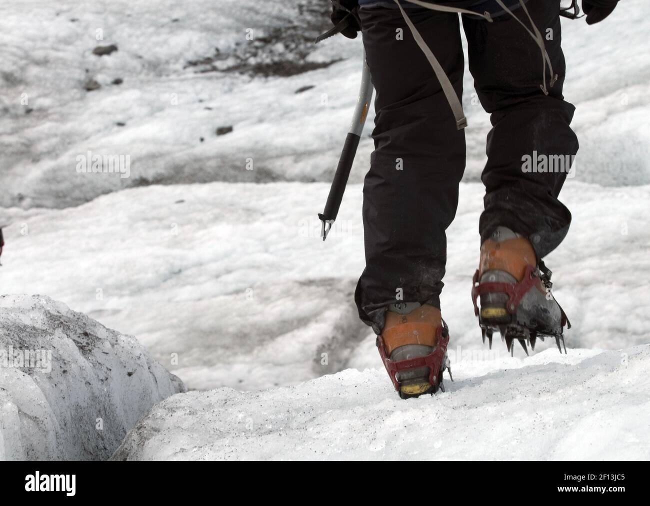 Proper travel on Matanuska Glacier ice involves crampons and an ice axe