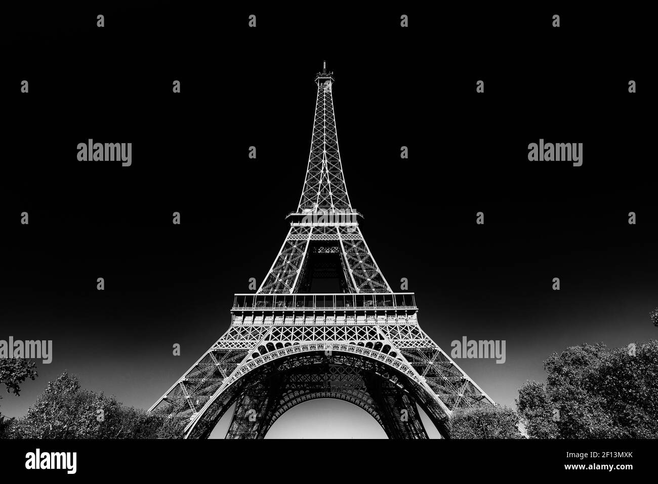 Eiffel Tower with sunny blue sky in Paris, France (black & white) Stock Photo