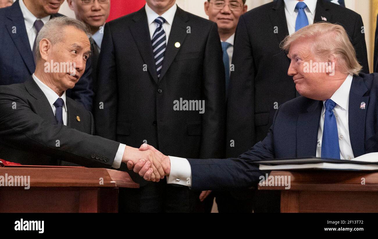 President Donald Trump joined by Chinese Vice Premier Liu He sign the U.S. China Phase One Trade Agreement Wednesday Jan. 15 2020 in the East Room of the White House. Stock Photo