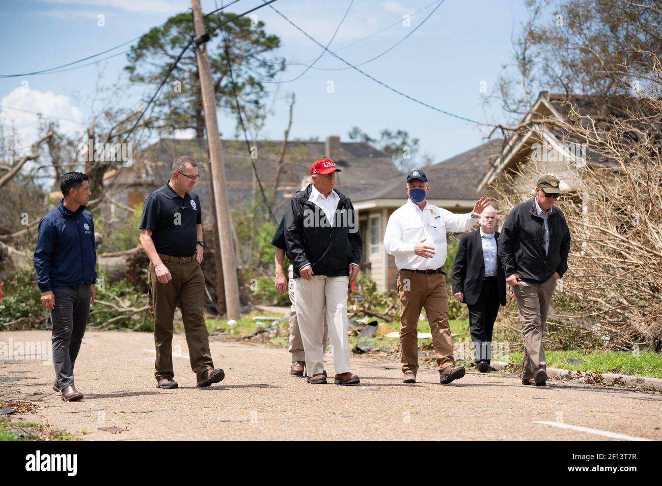 President Donald Trump visits a neighborhood Saturday Aug 29 2020 in Lake Charles La. to view damage caused by Hurricane Laura. Stock Photo