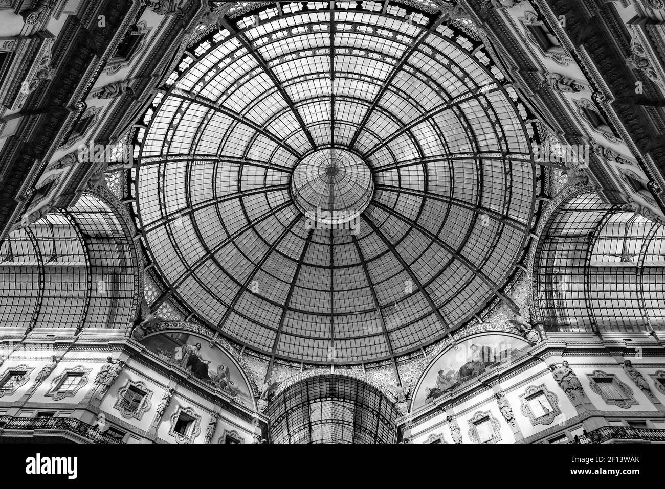 Glass dome of Galleria Vittorio Emanuele II in Milan, Italy's oldest shopping mall (black & white) Stock Photo