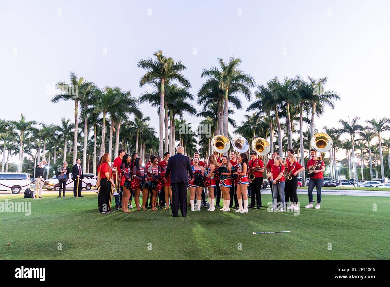 President Donald Trump thanks members of the Florida Atlantic University marching band for their performance Sunday evening Feb. 2 2020 outside the Trump International Golf Club in West Palm Beach Fla. prior to President Trump attending a Super Bowl party. Stock Photo