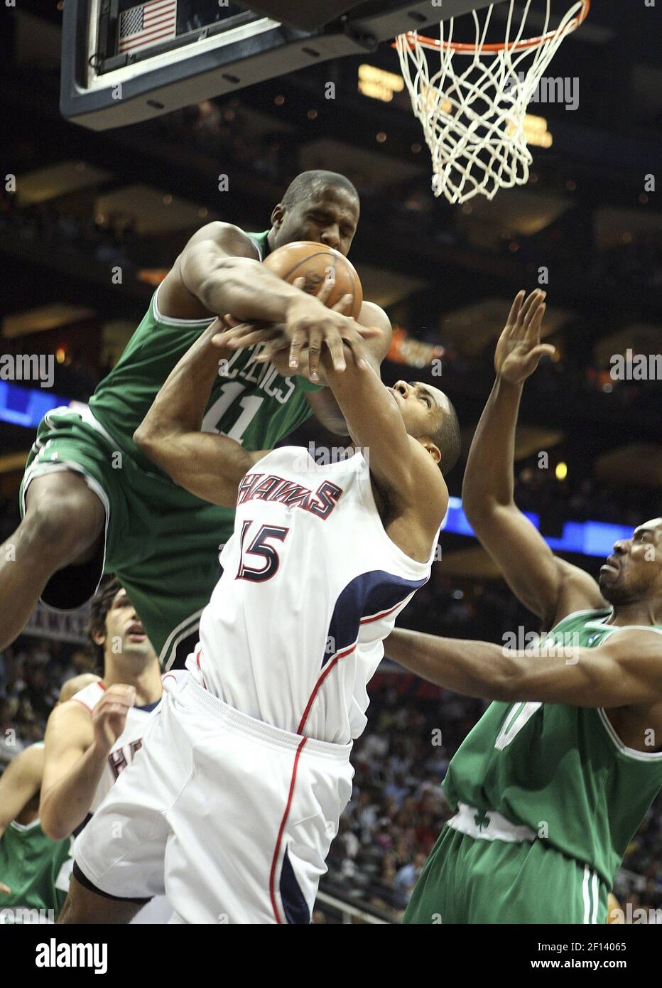 Atlanta Hawks Forward Al Horford 15 Is Fouled By Boston Celtics Forward Glen Davis 11 In The First Half Of Game 4 In The Nba Eastern Conference Playoffs At Philips Arena In