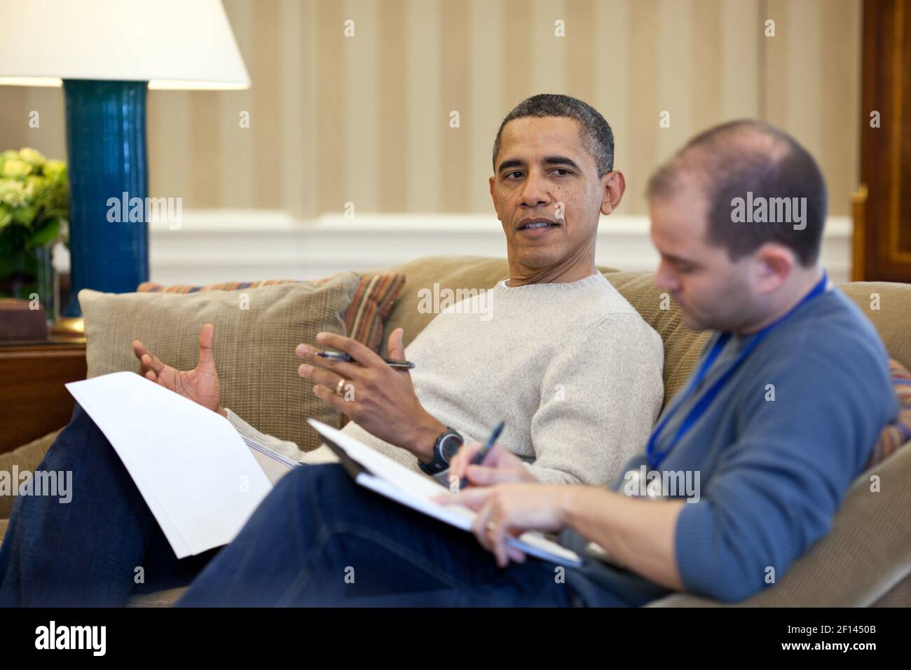 President Barack Obama works on his speech to the American Israel Public Affairs Committee (AIPAC) with Ben Rhodes Deputy National Security Advisor for Strategic Communications in the Oval Office Saturday March 3 2012. Stock Photo