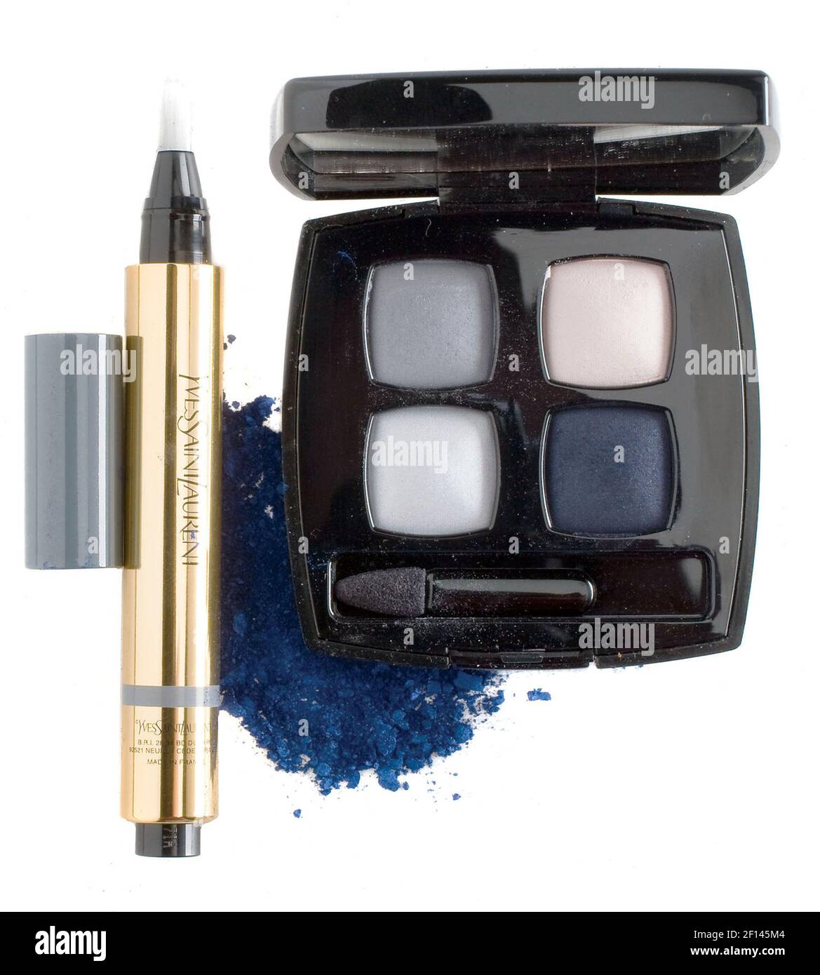 From left to right, YSL's Eye Colour Touch eye shadow pen in steel blue