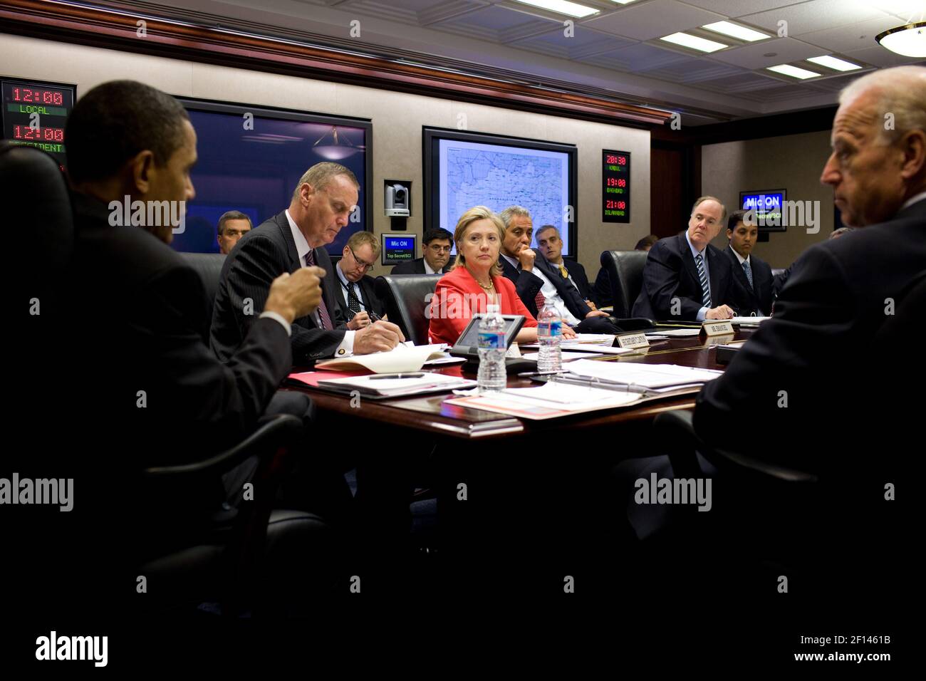 President Barack Obama speaks, during a meeting on Afghanistan and Pakistan, in the Situation Room of the White House, April 16, 2010. Listening at the table, from left, are General James Jones, Hillary Rodham Clinton, Rahm Emanuel, Tom Donilon, Rajiv Shah, and Vice President Joe Biden Stock Photo