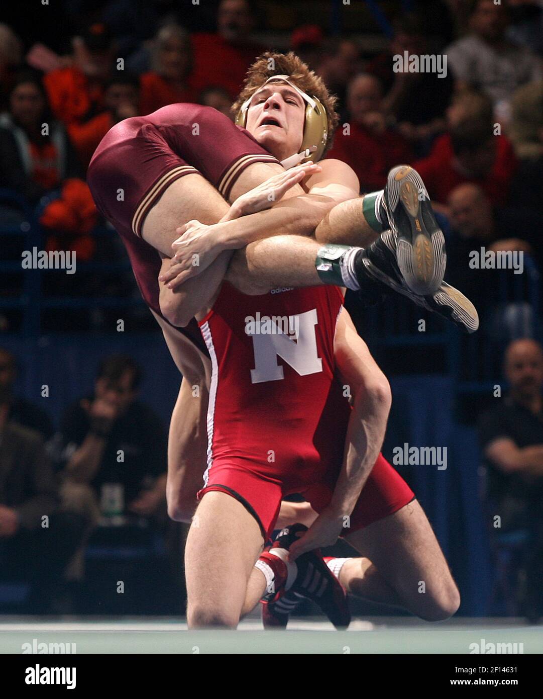 Nebraska's Paul Donahoe (front) tangles with Minnesota's Jayson Ness in