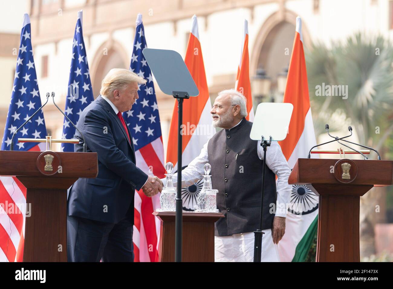 President Donald Trump and Indian Prime Minister Narendra Modi shake hands at their joint press statement Tuesday Feb. 25 2020 on the lawn of Hyderabad House in New Delhi. Stock Photo
