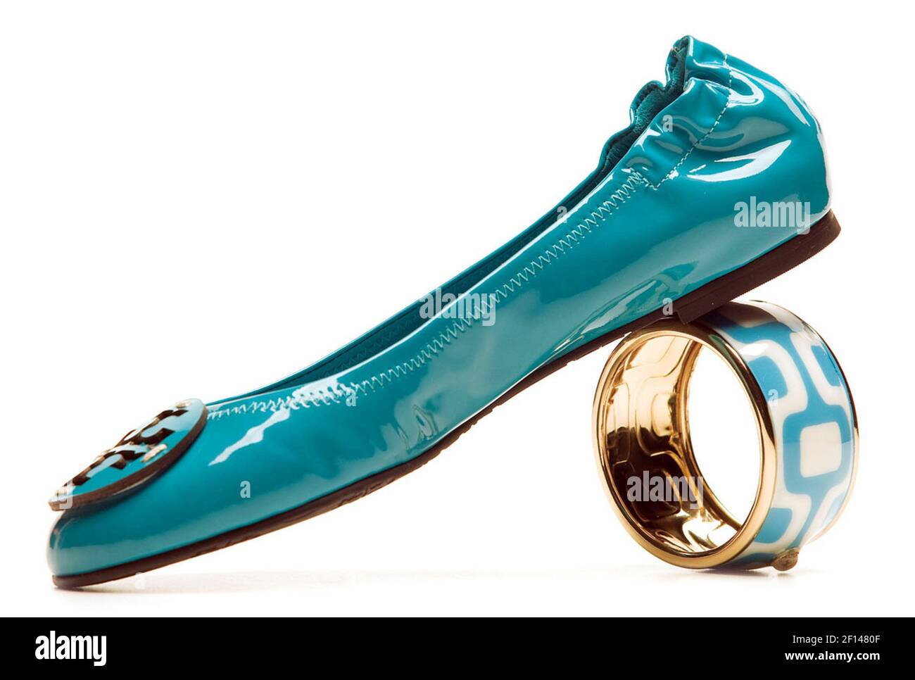 The ever-popular Reva ballet flats from Tory Burch come in a spruced-up  patent turquoise shade, $195, Nordstrom; accent your wrist with a  white-and-turquoise FR Styles enamel bracelet, $200, Head Over Heels, Fort