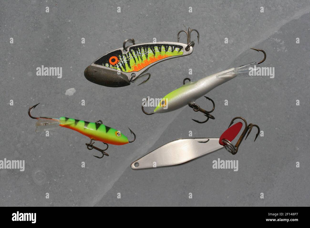 John Reddy uses an assortment of lures to fish for lake trout at