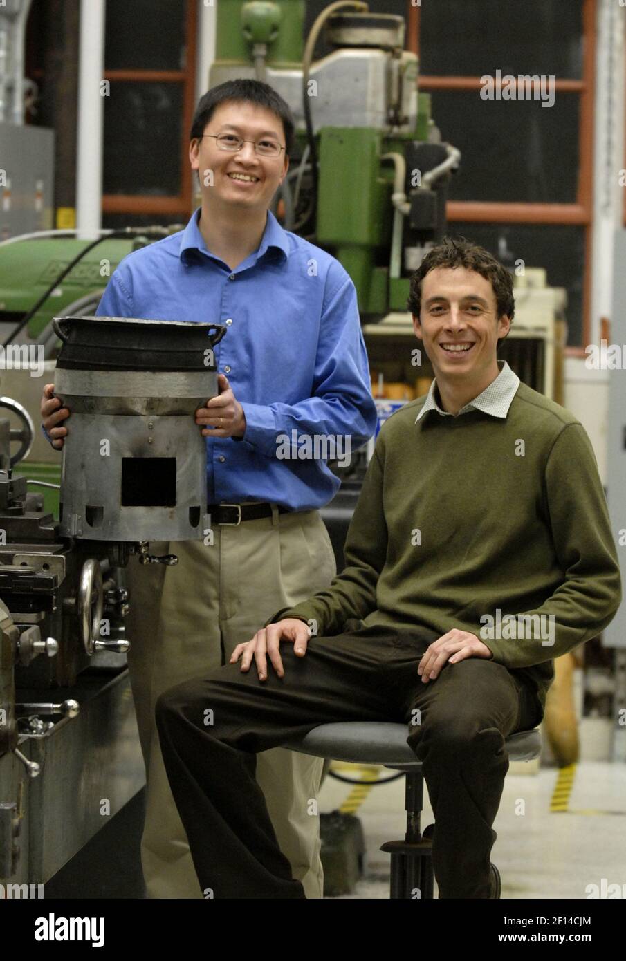 ken-chow-left-a-senior-mechanical-engineer-and-dave-youmans-a-mechanical-engineer-stand-in-the-shop-at-lawrence-berkeley-national-laboratory-december-20-2007-in-berkeley-california-the-two-work-with