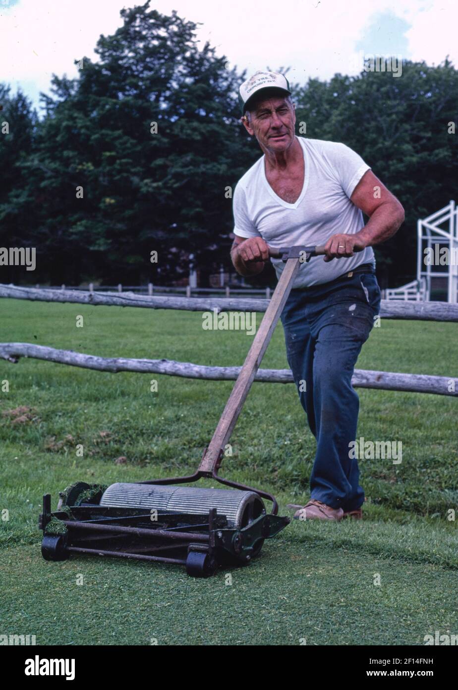1980s man pushing a lawn mower hires stock photography and images Alamy