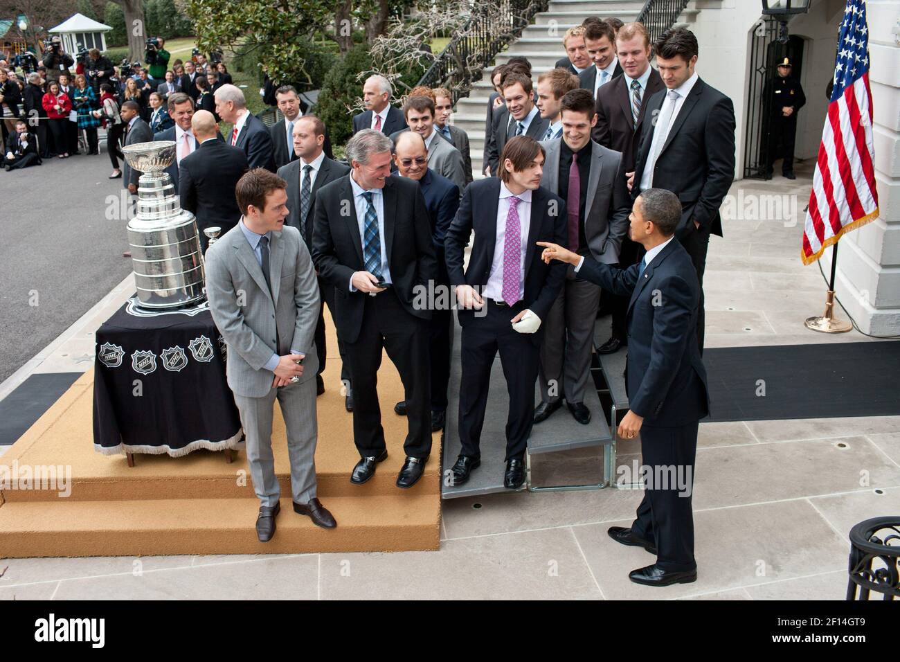 President Barack Obama talks with members of the Stanley Cup Champion Chicago Blackhawks following a ceremony to honor the team's 2009-10 championship season on the South Lawn of the White House, March 11, 2011 Stock Photo