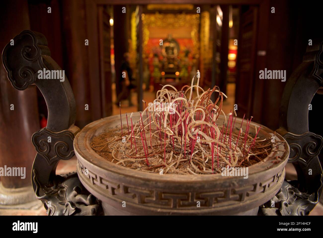 Incense sticks burning in an incense bowl at the Temple of Literature