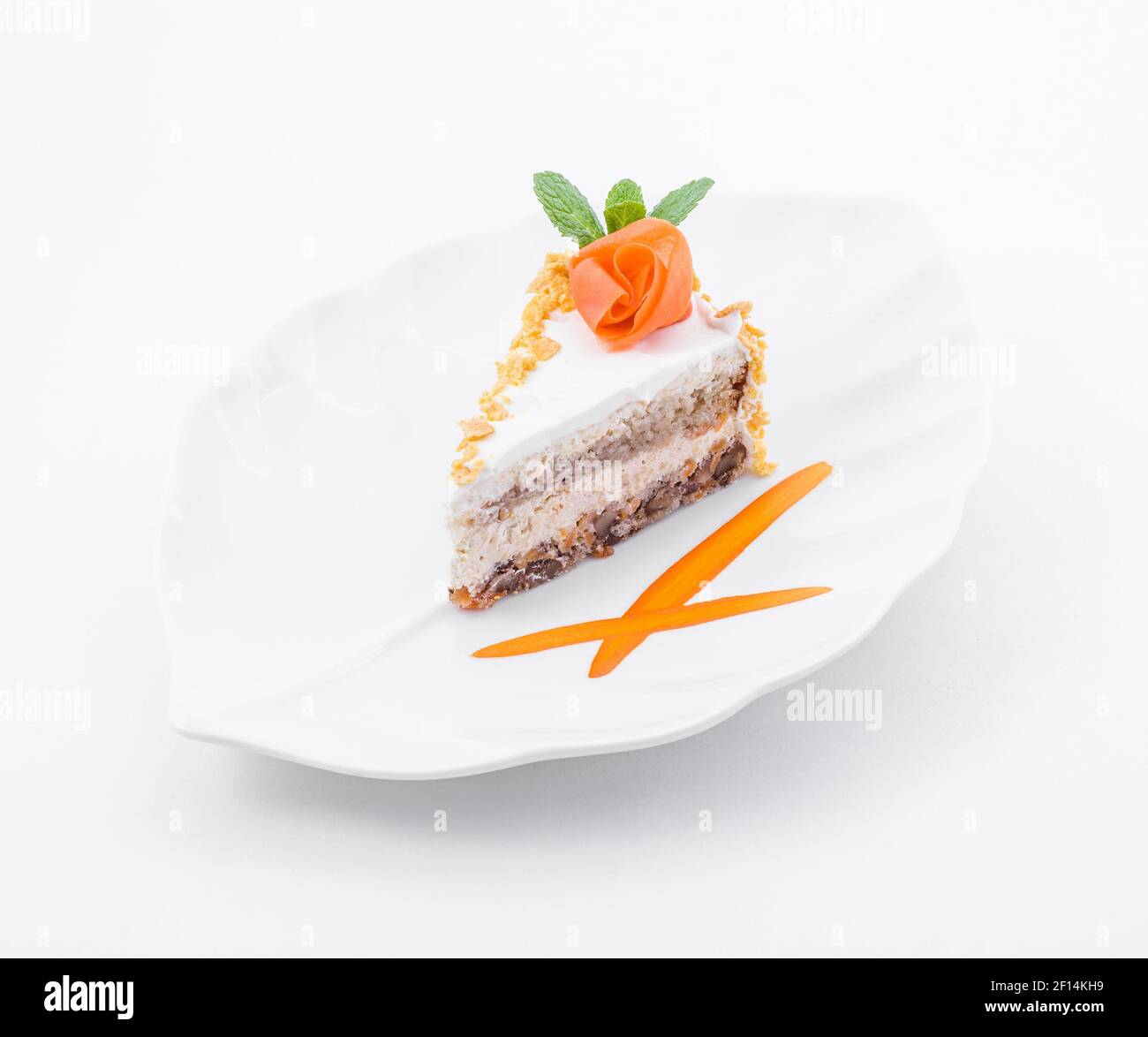 Piece of cake with mint and rose Stock Photo