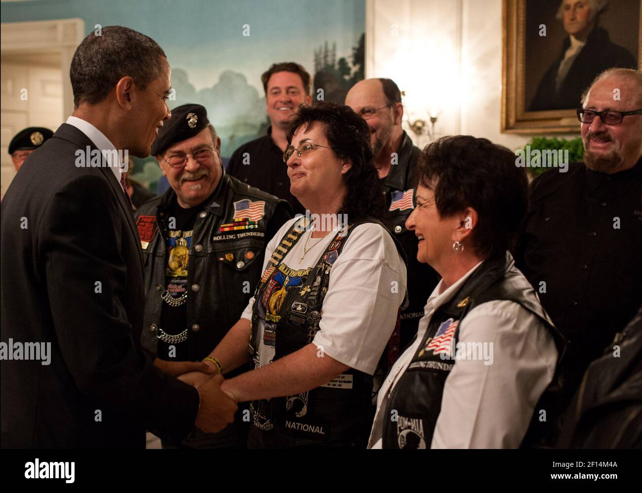 President Barack Obama greets members of the Rolling Thunder in the Diplomatic Reception Room of the White House May 25 2012. Stock Photo