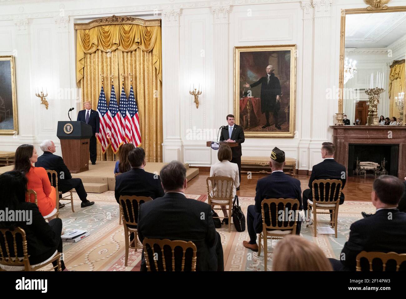 President Donald Trump listens as Secretary of the Department of Veterans Affairs Robert Wilke addresses his remarks at the PREVENTS task force roadmap Wednesday June 17 2020 in the East Room of the White House. Stock Photo