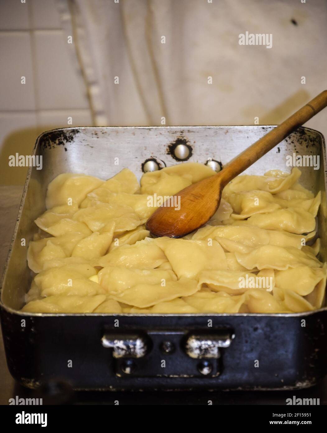 Raw ravioli with potato and cheese Stock Photo - Alamy