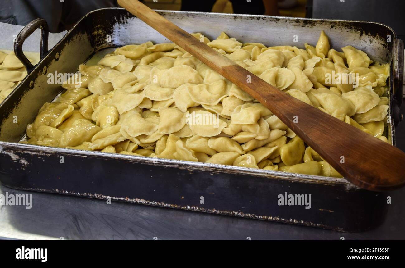 Raw ravioli with potato and cheese Stock Photo - Alamy