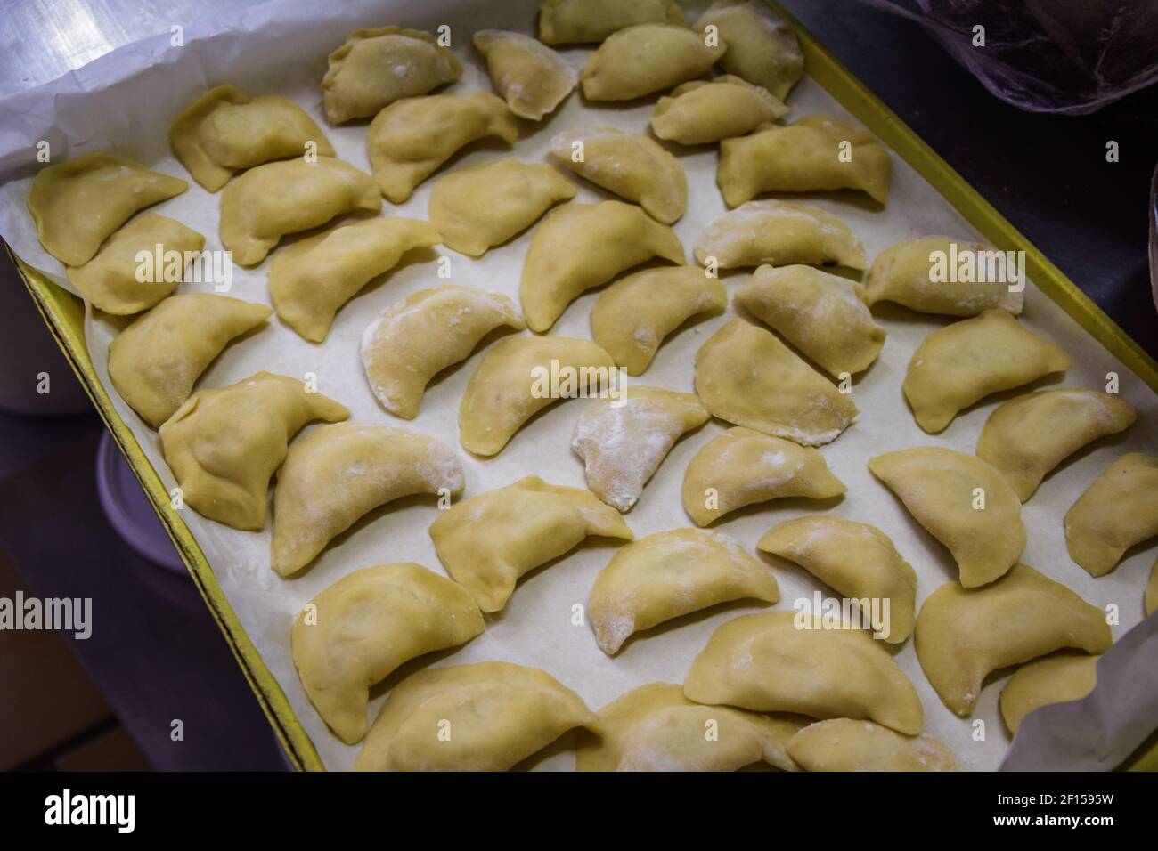 Raw ravioli with potato and cheese Stock Photo - Alamy