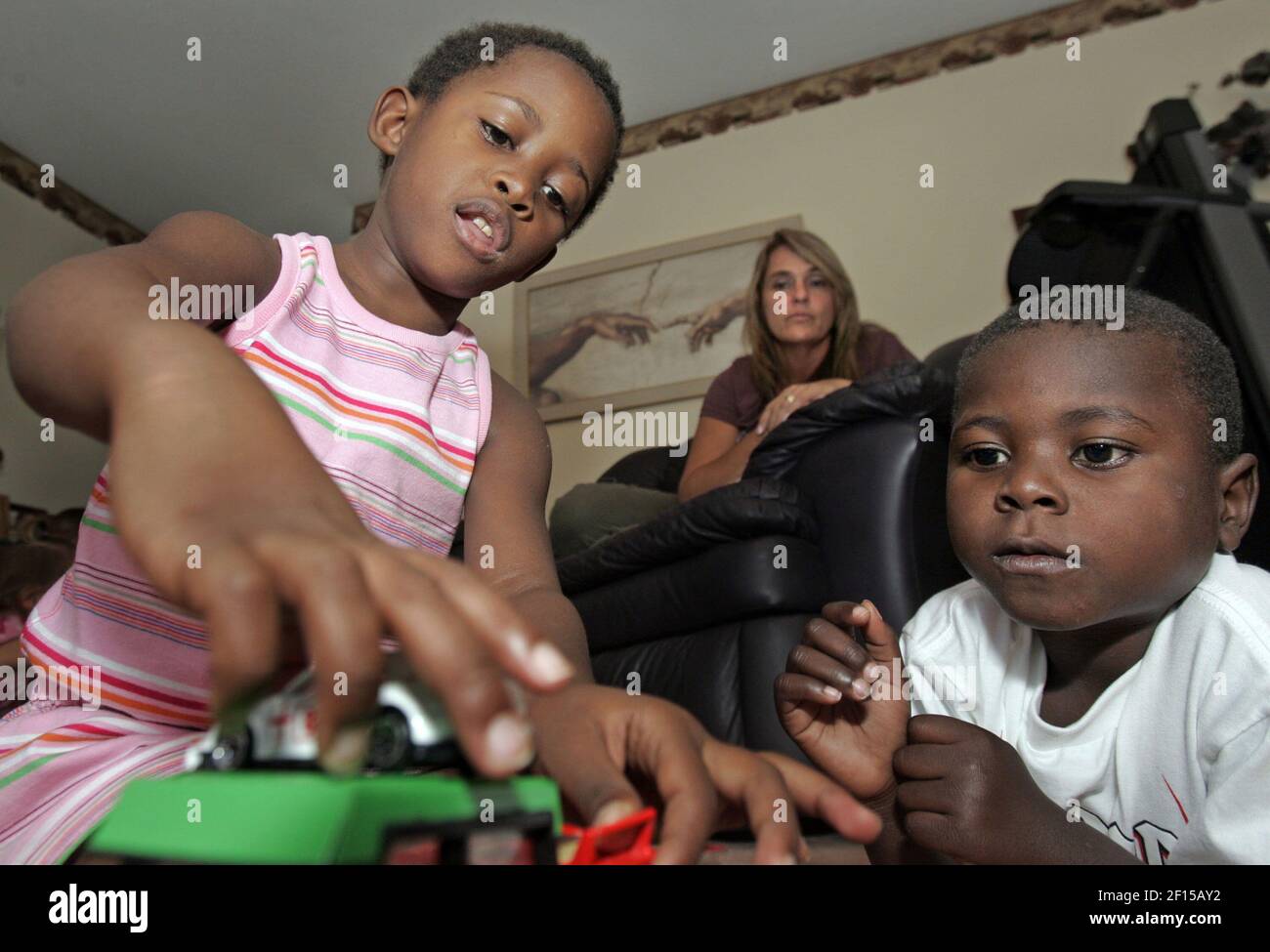Rachael, left, and Tony Lakin arrived in the United States from Uganda