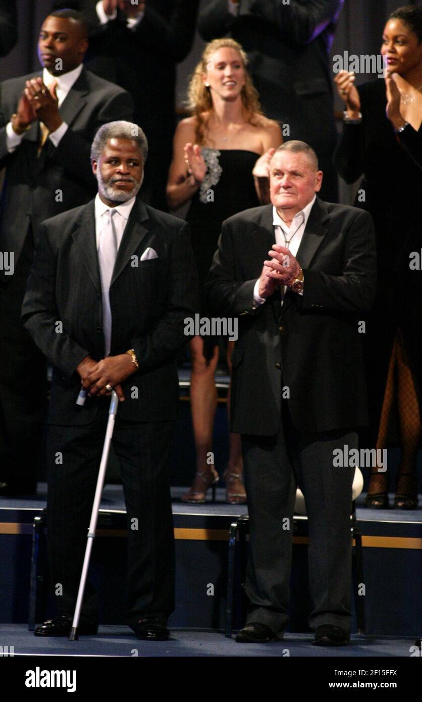 Earl Campbell (left) and Bum Phillips (right) are recognized as part of  Houston's 41 sports legends during the opening ceremony of Super Bowl  XXXVIII in Houston, Texas, January 26, 2004. Football has
