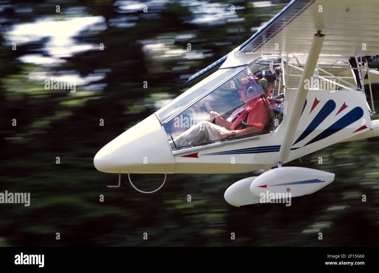 Pilot Gary Aman, right, with first time flyer Judy Lewis, comes in for ...