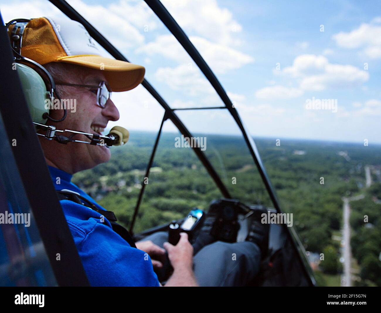 Pilot Don James of Kent, Ohio, flies in his Chinook over a fly-in near ...