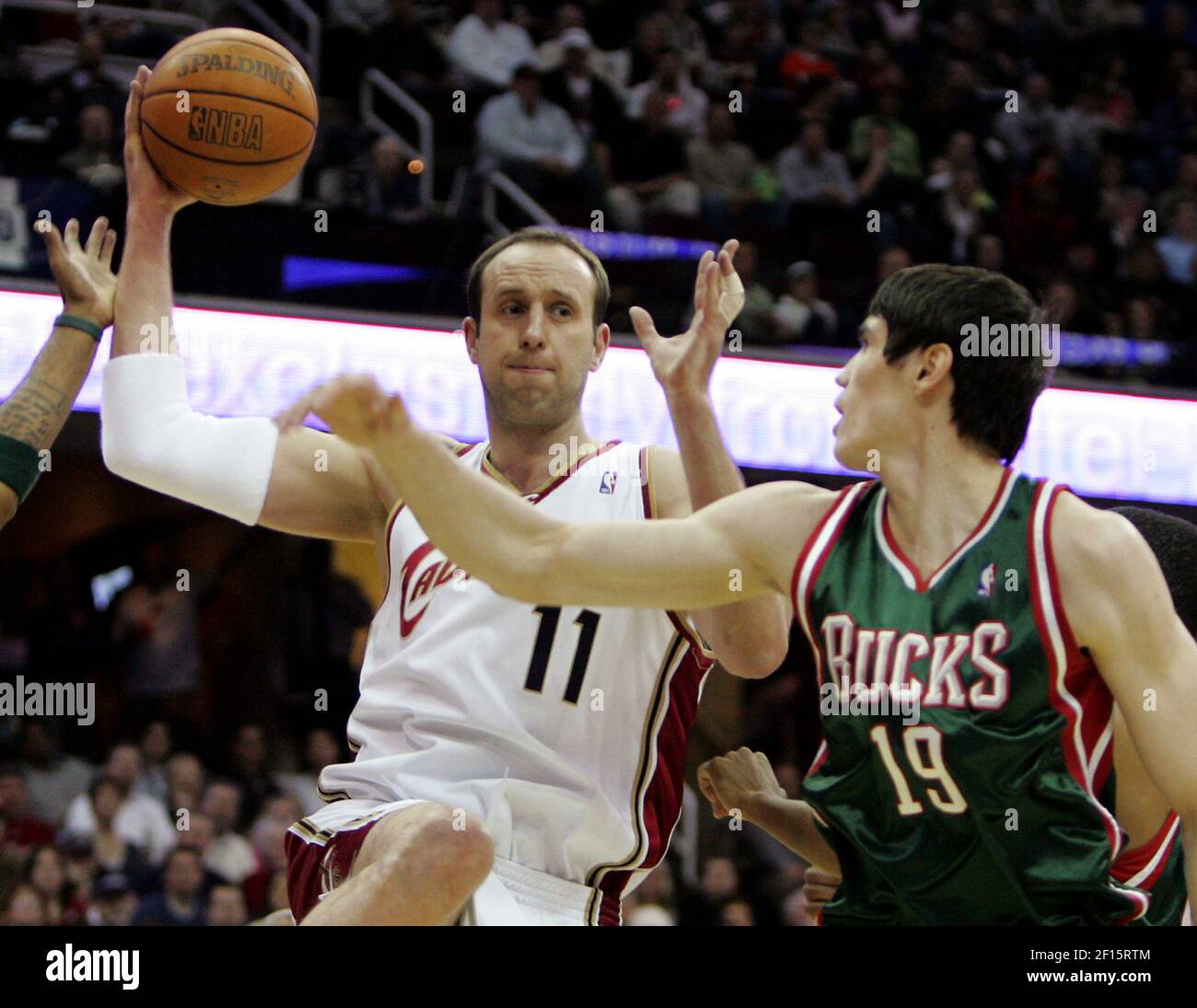 Cleveland Cavaliers' Zydrunas Ilgauskas (left) rebounds inside against ...