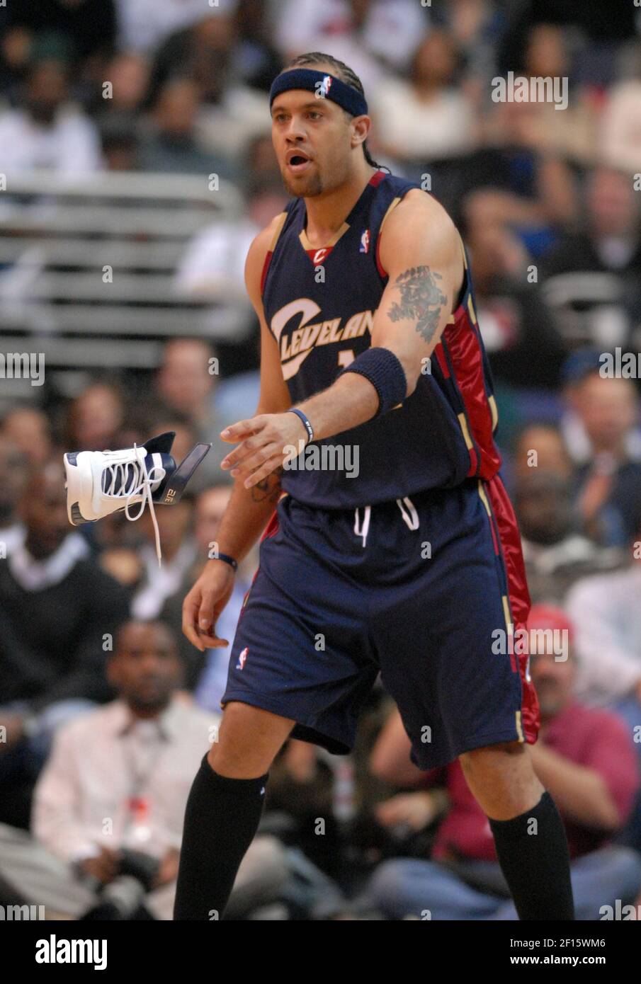 The Cleveland Cavaliers' Ira Newble tosses aside his shoe as he tries to  play defense against the Washington Wizards in the first half of their game  Friday, April 6, 2007, at the