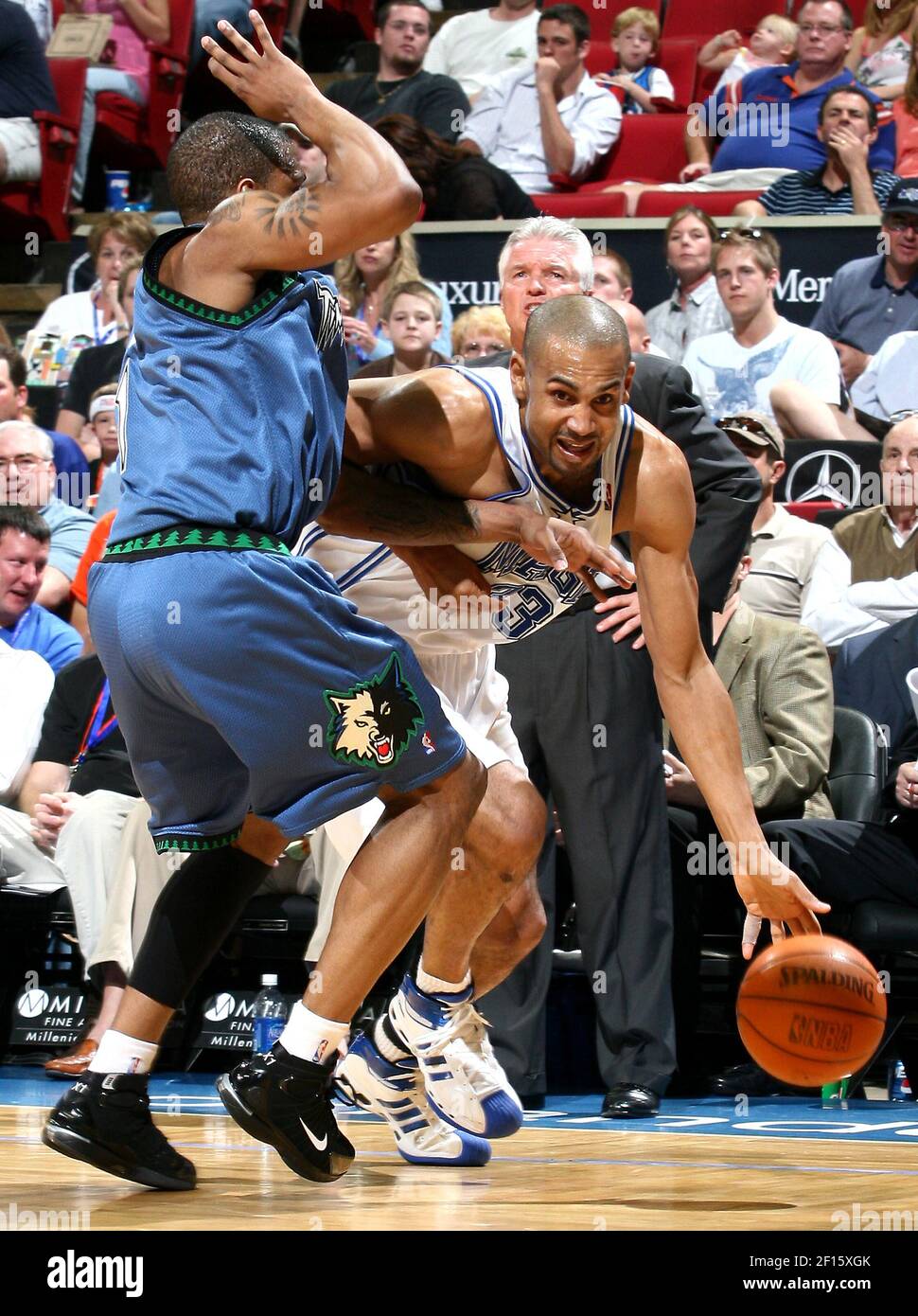 The Orlando Magic's Grant Hill drives around Minnesota Timberwolves  defender Rashad McCants during game action at the Amway Arena in Orlando,  Florida, Sunday, April 1, 2007. The Timberwolves defeated the Magic 105-104