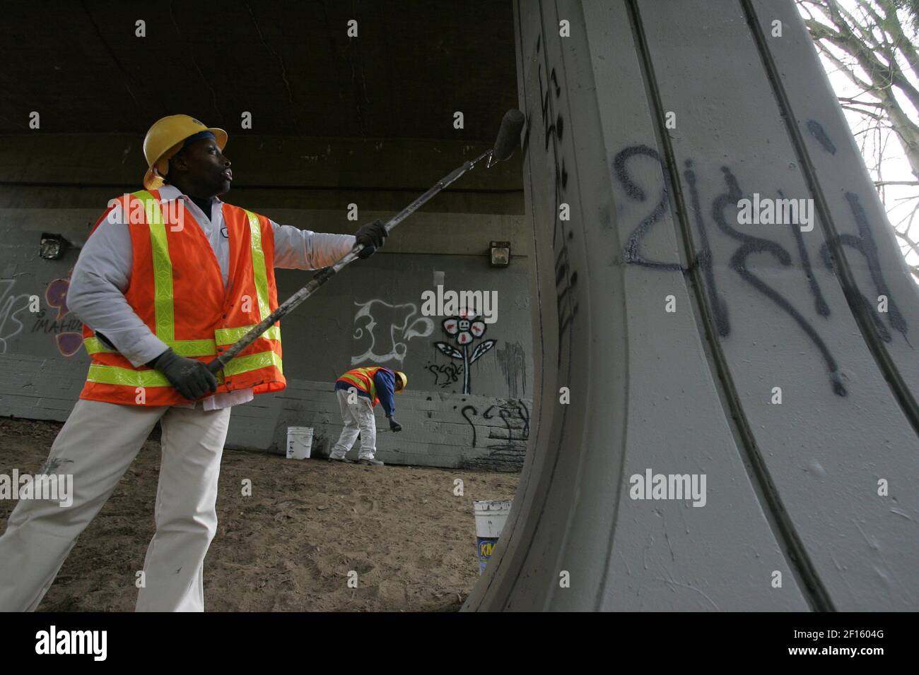Seattle public utilities graffiti rangers paint over tags and other