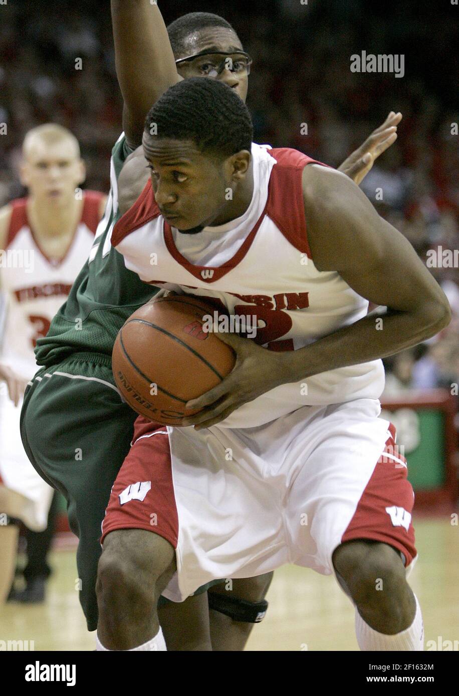 Michigan State's Maurice Joseph throws a hip into Wisconsin's Alando Tucker as he tries to drive the lane in the first half, Saturday, March 3, 2007, in Madison, Wisconsin. The Badgers defeated the Spartans 52-50. (Photo by Joe Koshollek/Milwaukee Journal Sentinel/MCT/Sipa USA) Stock Photo