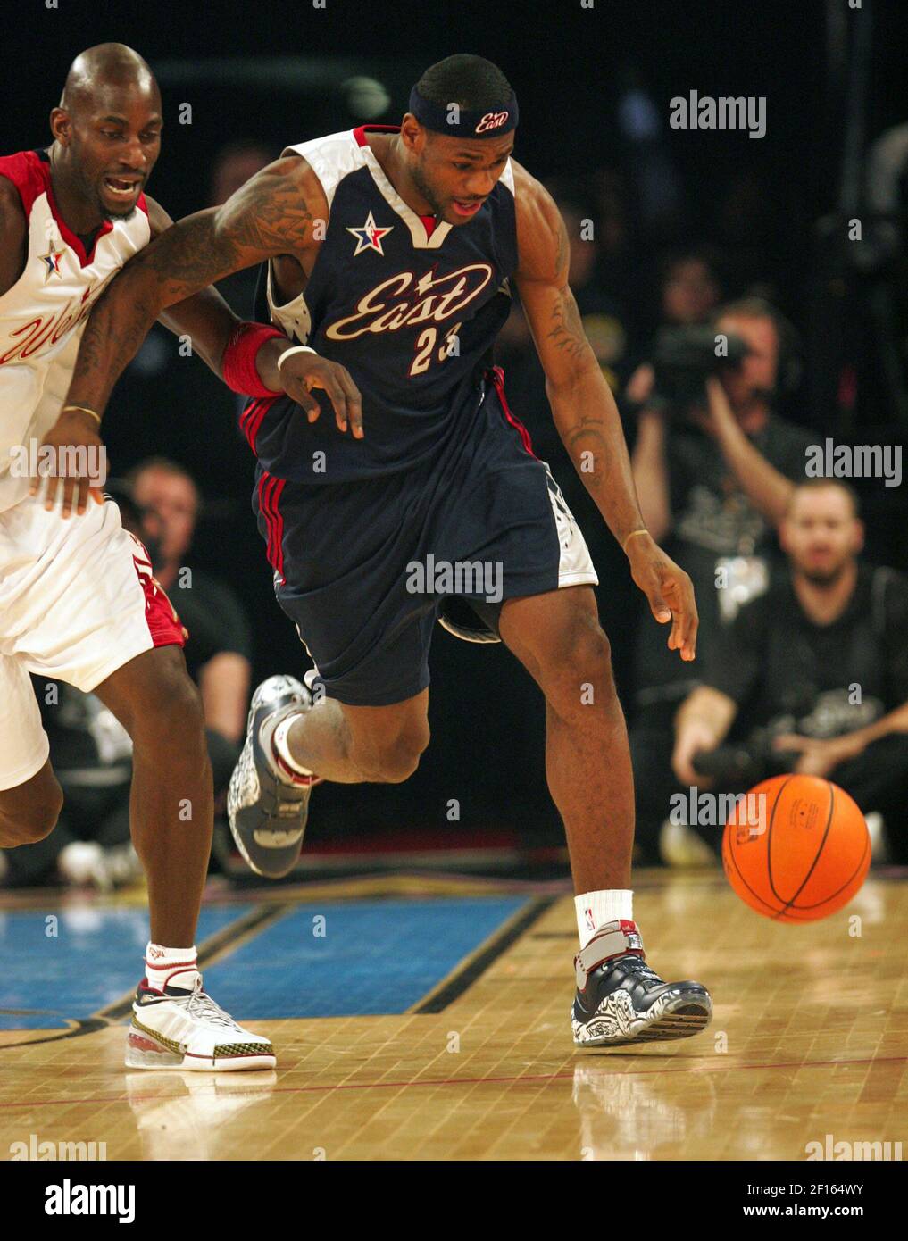 West All-Star player Kevin Garnett (left) battles the East's