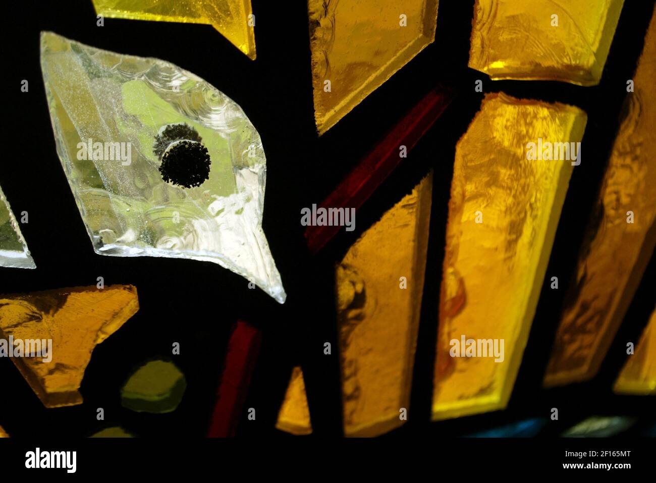 Sand was used to form the eye of a dove in a stainedglass window by