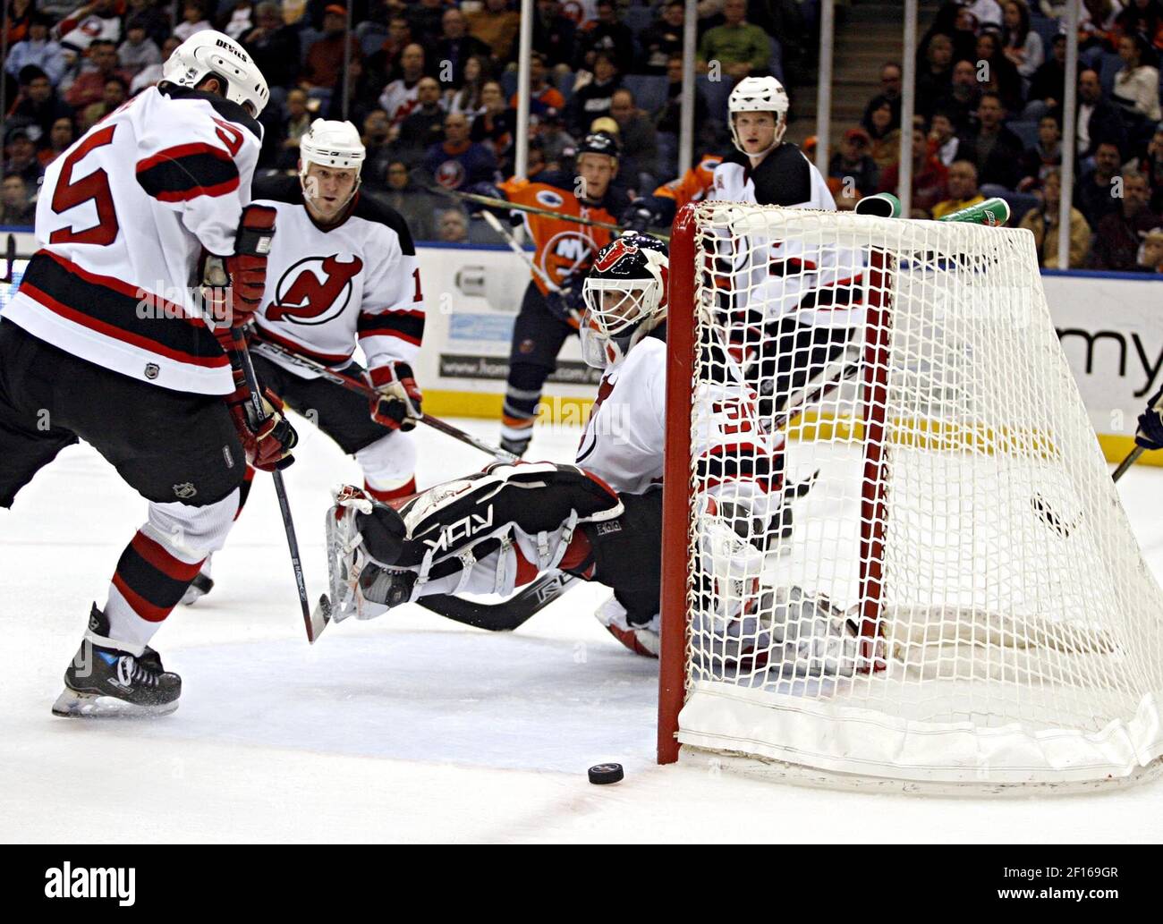 A shot by the New York Islanders Jason Blake (55) sails through New ...