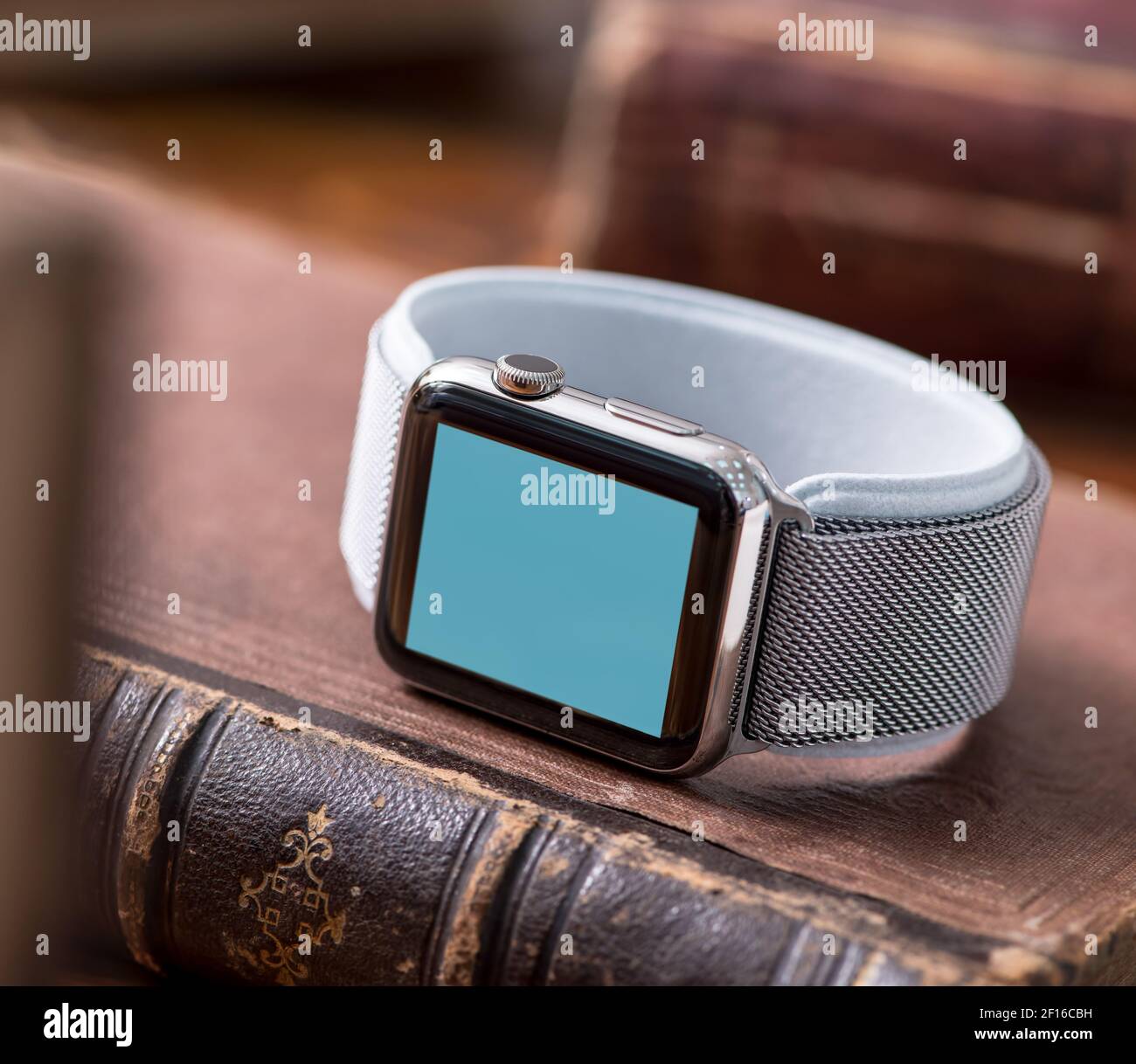 Mockup of smart-watch on the book. Clipping path Stock Photo