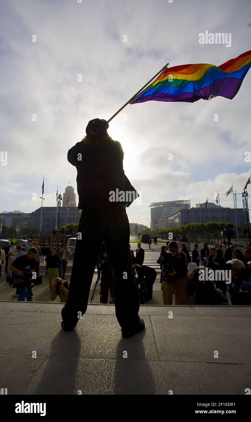 Paul Sodervick, of San Francisco, waves a rainbow flag outside San Francisco City Hall, on the second day of legal gay marriages in California, Tuesday, June 17, 2008. (Photo by Brian Baer/Sacramento Bee/MCT/Sipa USA) Stock Photo