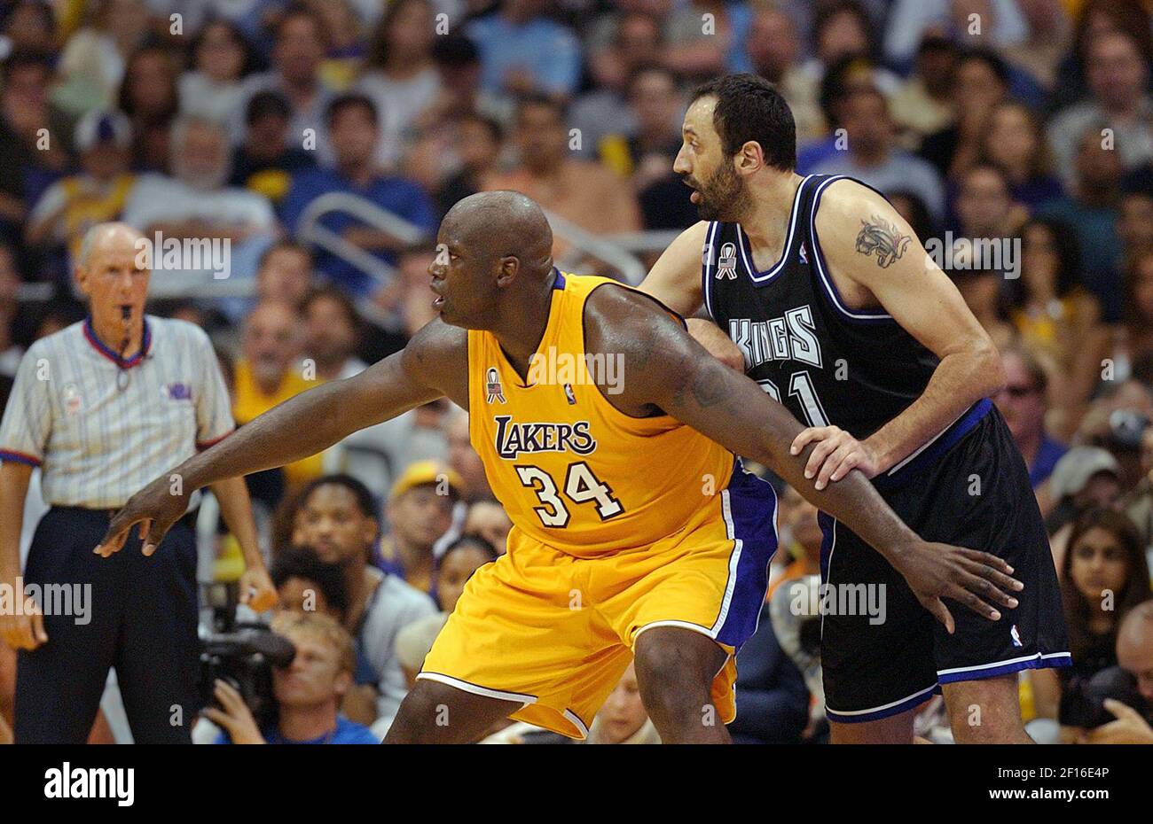 Sacramento Kings' Vlade Divac looks up as he loses the ball in the second  quarter against the Los Angeles Lakers in Game 6 of the Western Conference  finals in Los Angeles., Friday
