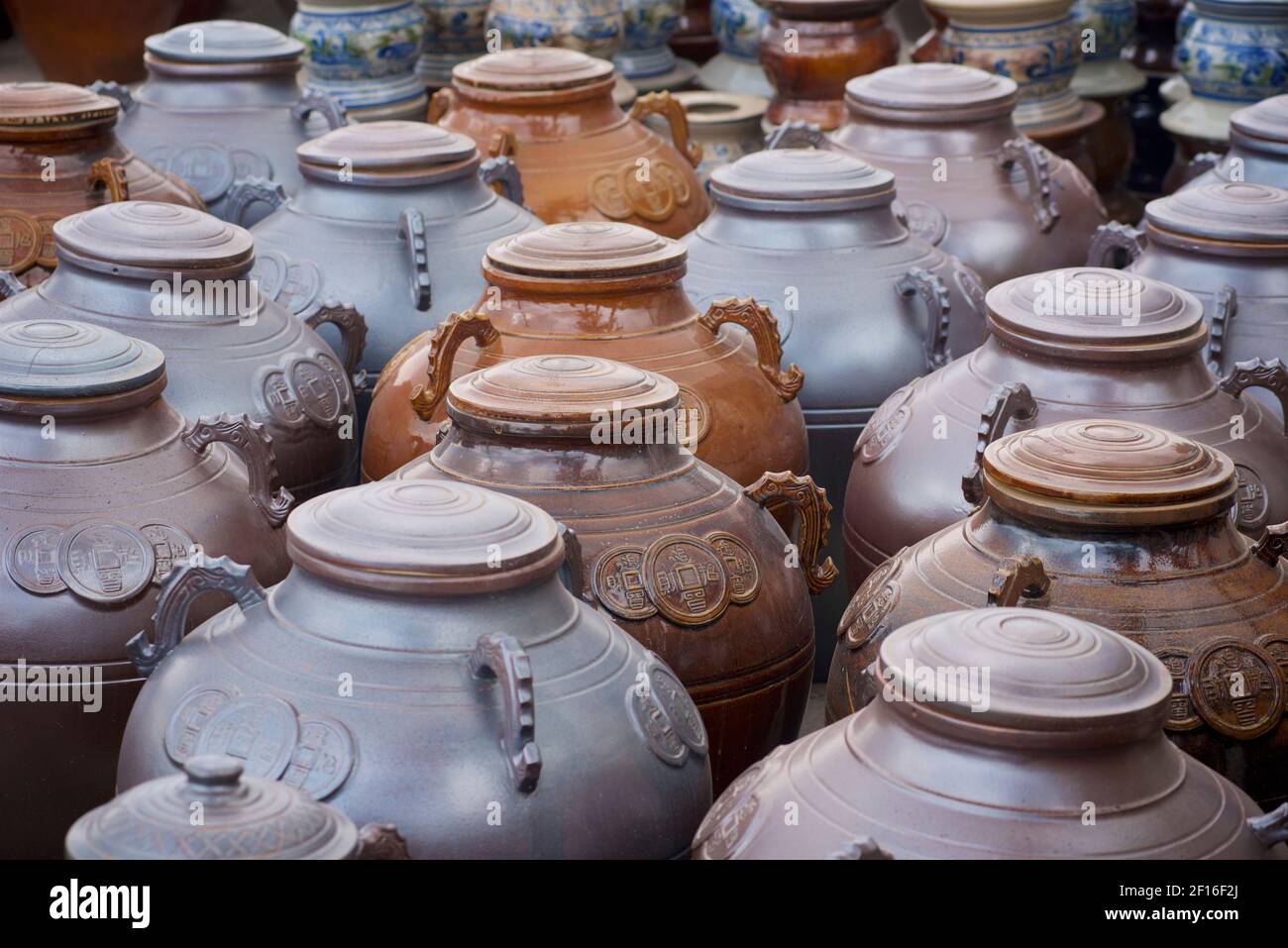 Vietnamese ceramics stacked and for sale. Vietnam, near Haiphong