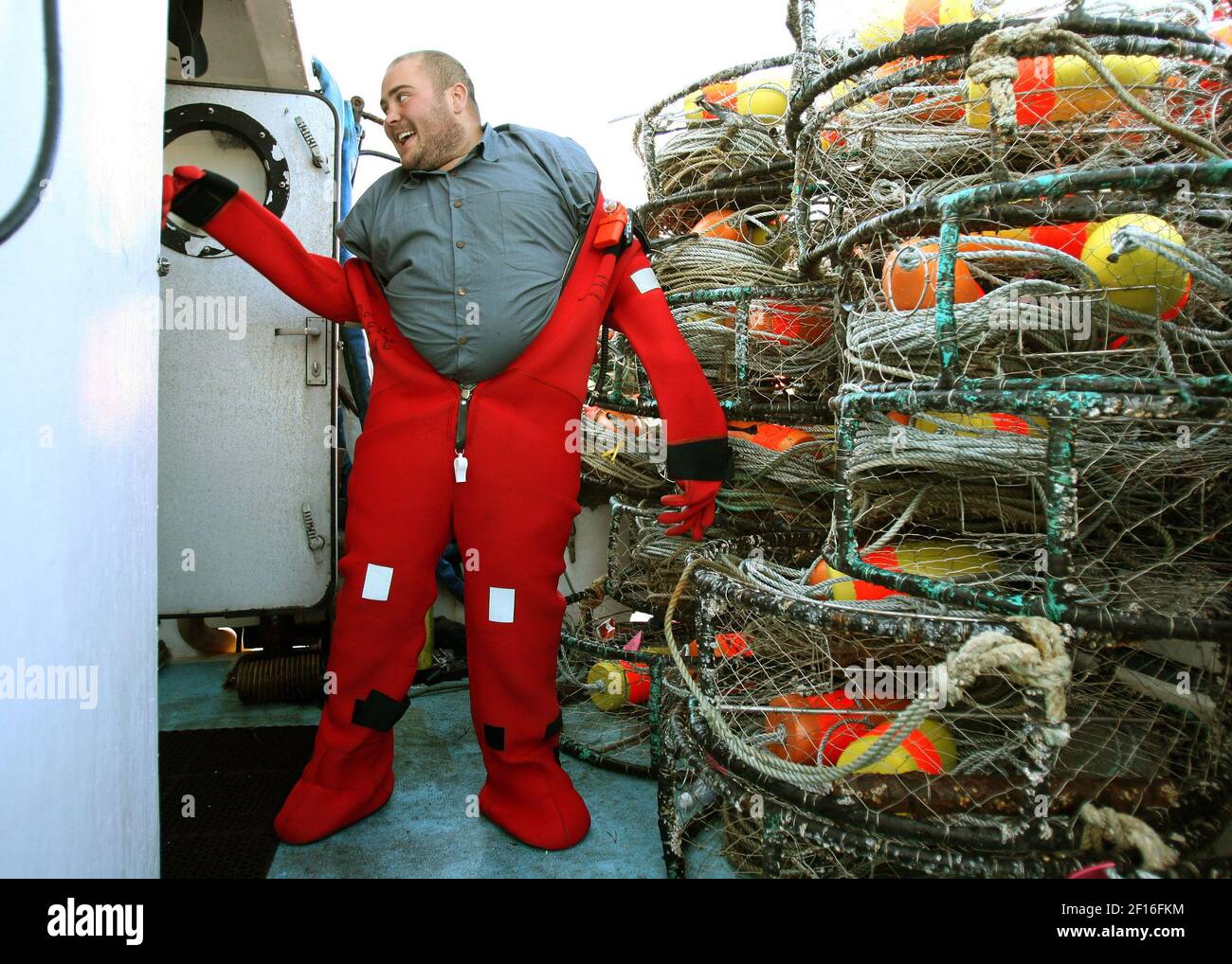 Fisherman Chris Burton, aboard the crabbing boat Double Eagle, yells